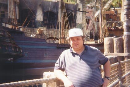 David in front of the Pirate Ship at Treasure Island